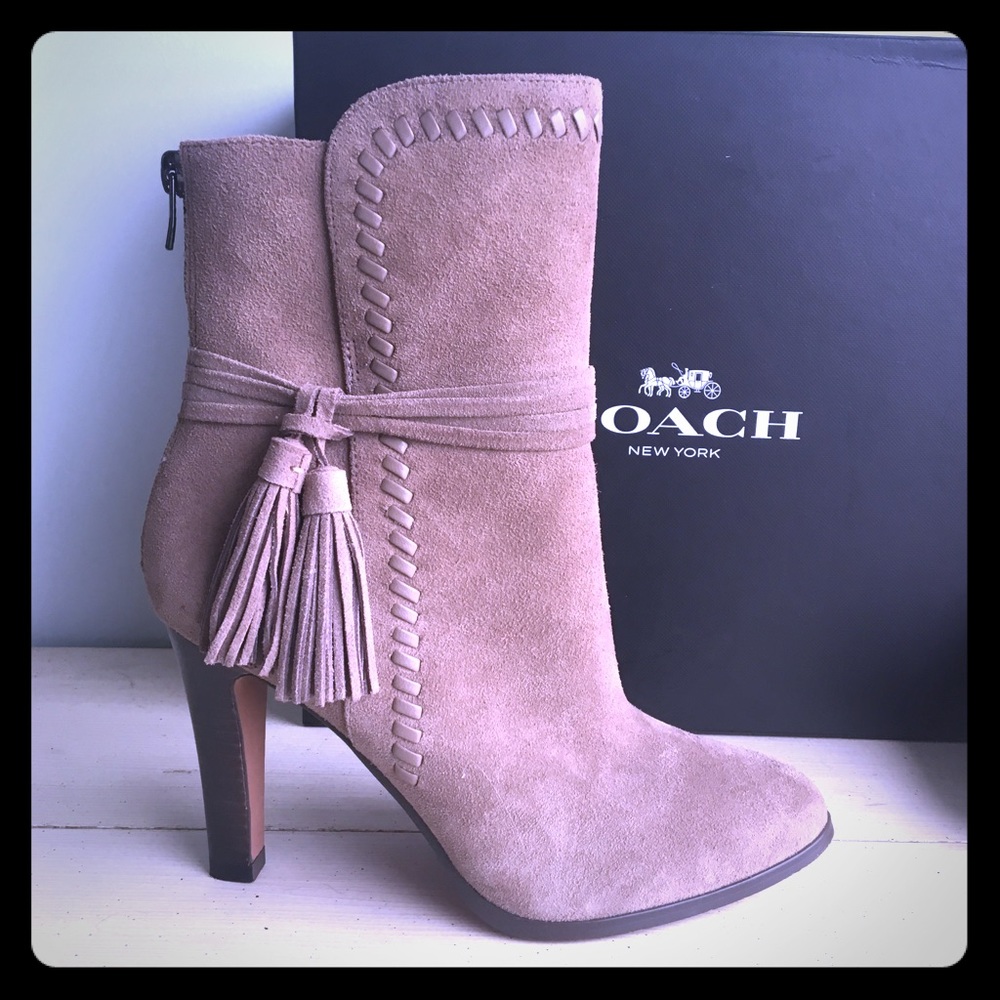 Coach boots with box.